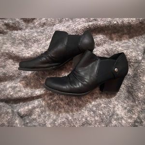 Heeled black booties